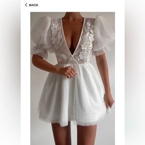 Size 10 Showpo mini white dress, puff sleeve with floral detail